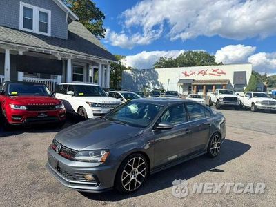 Czwarte zdjęcie samochodu z boku: 2017 VOLKSWAGEN JETTA GLI VIN:3VW4T7AJ2HM384751 - miniatura