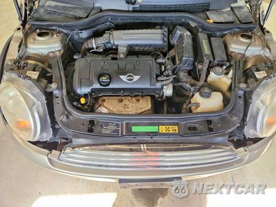Zdjęcie 11 z 12 samochodu: 2007 MINI COOPER VIN:WMWMF33577TU62392 - miniatura