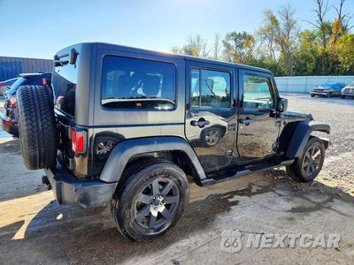 Trzecie zdjęcie samochodu z tyłu: 2010 JEEP WRANGLER UNLIMITED SPORT VIN:1J4BA3H13AL112127 - miniatura
