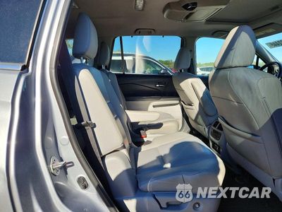 Zdjęcie 11 z 13 samochodu: 2019 HONDA PILOT TOURING VIN:5FNYF6H65KB001954 - miniatura