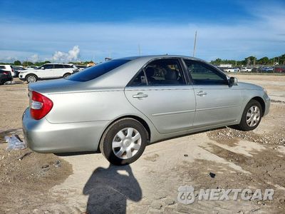Trzecie zdjęcie samochodu z tyłu: 2003 TOYOTA CAMRY LE VIN:4T1BE32K43U788199 - miniatura