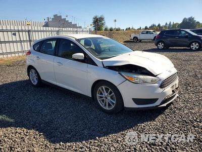 Czwarte zdjęcie samochodu z boku: 2016 FORD FOCUS SE VIN:1FADP3K25GL283202 - miniatura
