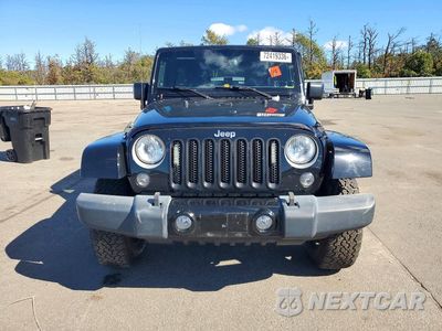Piąte zdjęcie samochodu w środku: 2016 JEEP WRANGLER UNLIMITED SAHARA VIN:1C4HJWEG8GL198649 - miniatura