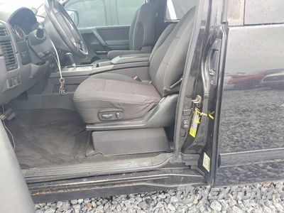 Zdjęcie 12 z 13 samochodu: 2011 NISSAN TITAN SV VIN:1N6BA0CAXBN313103 - miniatura