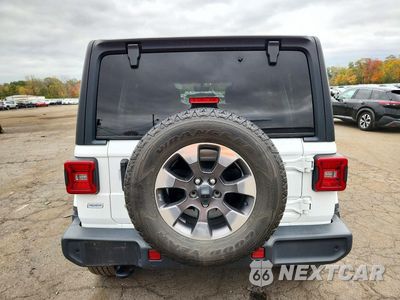 Zdjęcie 6 z 12 samochodu: 2018 JEEP WRANGLER UNLIMITED SAHARA VIN:1C4HJXEG2JW124641 - miniatura