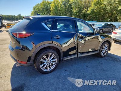 Trzecie zdjęcie samochodu z tyłu: 2021 MAZDA CX-5 GRAND TOURING VIN:JM3KFBDM3M1388624 - miniatura