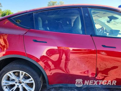 Zdjęcie 11 z 14 samochodu: 2024 TESLA MODEL Y VIN:7SAYGDEE9RF063190 - miniatura