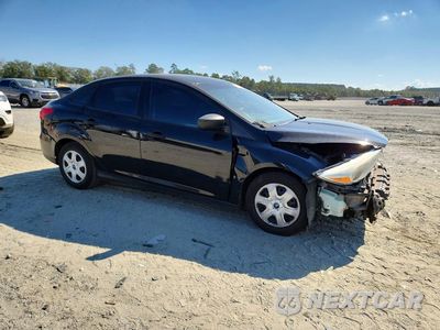 Czwarte zdjęcie samochodu z boku: 2017 FORD FOCUS S VIN:1FADP3E29HL337386 - miniatura