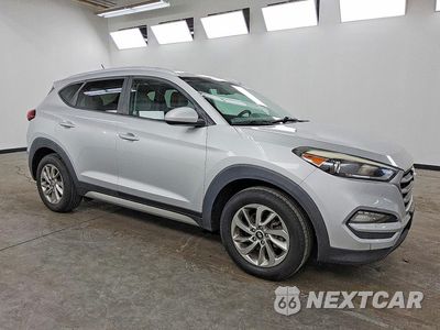 Czwarte zdjęcie samochodu z boku: 2017 HYUNDAI TUCSON SE VIN:KM8J3CA40HU289542 - miniatura