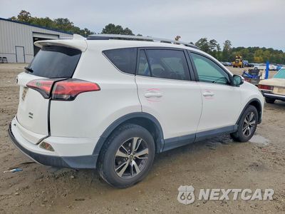 Trzecie zdjęcie samochodu z tyłu: 2018 TOYOTA RAV4 VIN:2T3RFREV5JW753020 - miniatura