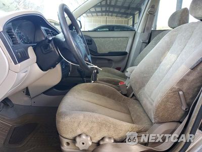 Zdjęcie 7 z 12 samochodu: 2001 HYUNDAI ELANTRA GLS VIN:KMHDN45D91U131312 - miniatura