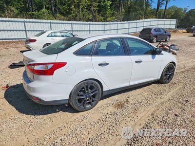 Trzecie zdjęcie samochodu z tyłu: 2014 FORD FOCUS S VIN:1FADP3E22EL357328 - miniatura