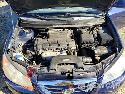 Zdjęcie 11 z 12 samochodu: 2010 HYUNDAI ELANTRA BLUE VIN:KMHDU4AD9AU133599 - miniatura