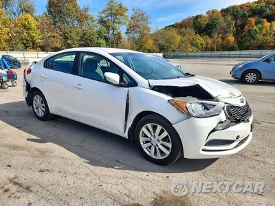 Czwarte zdjęcie samochodu z boku: 2014 KIA FORTE LX VIN:KNAFX4A68E5212605 - miniatura