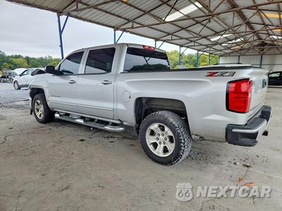Drugie zdjęcie samochodu z przodu: 2018 CHEVROLET SILVERADO K1500 LT VIN:3GCUKREC5JG499734 - miniatura