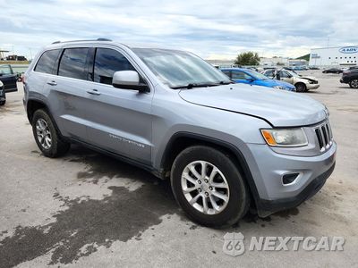 Czwarte zdjęcie samochodu z boku: 2016 JEEP GRAND CHEROKEE LAREDO VIN:1C4RJFAG0GC364849 - miniatura