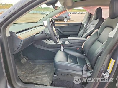 Zdjęcie 7 z 12 samochodu: 2023 TESLA MODEL Y VIN:7SAYGDEE7PF839765 - miniatura