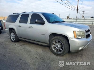 Czwarte zdjęcie samochodu z boku: 2010 CHEVROLET SUBURBAN C1500 LT VIN:1GNUCJE07AR269124 - miniatura
