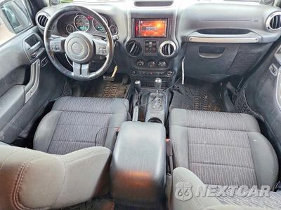 Zdjęcie 8 z 12 samochodu: 2012 JEEP WRANGLER UNLIMITED SAHARA VIN:1C4BJWEG5CL173448 - miniatura
