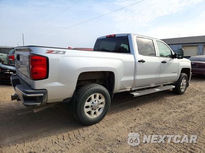Trzecie zdjęcie samochodu z tyłu: 2015 CHEVROLET SILVERADO K2500 HEAVY DUTY LT VIN:1GC1KVEG9FF152284 - miniatura