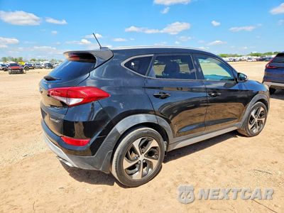 Trzecie zdjęcie samochodu z tyłu: 2017 HYUNDAI TUCSON SPORT VIN:KM8J33A22HU274085 - miniatura