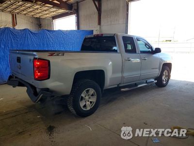 Trzecie zdjęcie samochodu z tyłu: 2018 CHEVROLET SILVERADO C1500 LT VIN:1GCRCREH7JZ181130 - miniatura