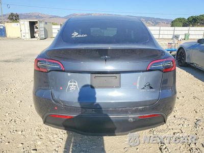 Zdjęcie 6 z 13 samochodu: 2022 TESLA MODEL Y VIN:7SAYGDEE6NF386560 - miniatura