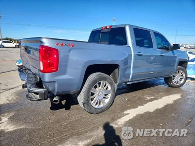 Trzecie zdjęcie samochodu z tyłu: 2016 CHEVROLET SILVERADO K1500 HIGH COUNTRY VIN:3GCUKTEC7GG160527 - miniatura
