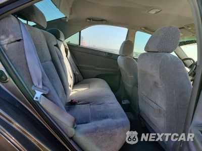 Zdjęcie 10 z 12 samochodu: 2003 TOYOTA CAMRY LE VIN:4T1BE32K33U718712 - miniatura
