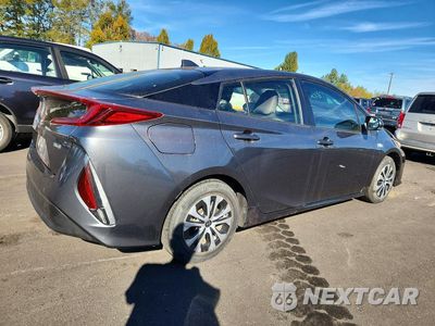 Trzecie zdjęcie samochodu z tyłu: 2021 TOYOTA PRIUS PRIME XLE VIN:JTDKAMFP7M3188926 - miniatura