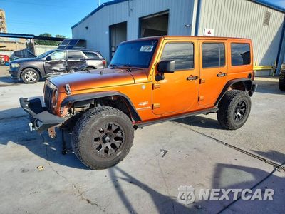 2011 JEEP WRANGLER UNLIMITED SAHARA 1J4BA5H13BL604184 - główne zdjęcie licytacji z USA - miniatura