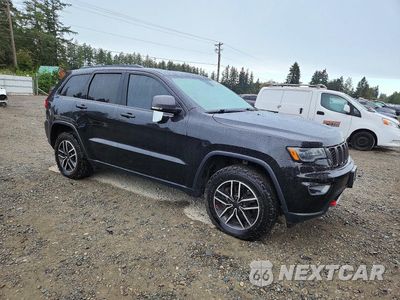 Czwarte zdjęcie samochodu z boku: 2020 JEEP GRAND CHEROKEE TRAILHAWK VIN:1C4RJFLT7LC418250 - miniatura