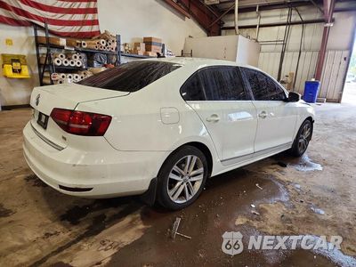 Trzecie zdjęcie samochodu z tyłu: 2017 VOLKSWAGEN JETTA SEL VIN:3VWL17AJ9HM384392 - miniatura