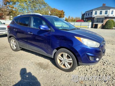 Czwarte zdjęcie samochodu z boku: 2010 HYUNDAI TUCSON GLS VIN:KM8JUCACXAU046816 - miniatura