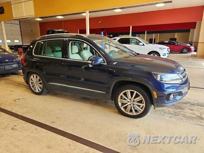 Czwarte zdjęcie samochodu z boku: 2015 VOLKSWAGEN TIGUAN S VIN:WVGBV7AX8FW607926 - miniatura