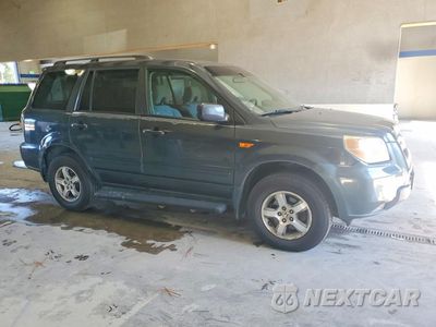 Czwarte zdjęcie samochodu z boku: 2006 HONDA PILOT EX VIN:2HKYF18466H563967 - miniatura