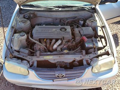 Zdjęcie 11 z 12 samochodu: 2002 TOYOTA COROLLA CE VIN:1NXBR12E92Z580336 - miniatura