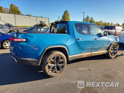Trzecie zdjęcie samochodu z tyłu: 2023 RIVIAN R1T ADVENTURE VIN:7FCTGAAA9PN022401 - miniatura
