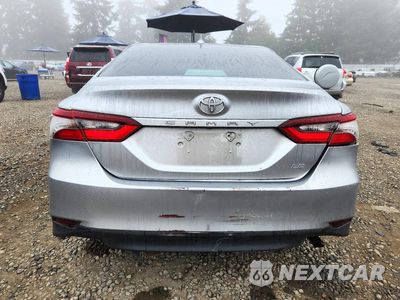 Zdjęcie 6 z 12 samochodu: 2021 TOYOTA CAMRY LE VIN:4T1C11AK9MU459036 - miniatura