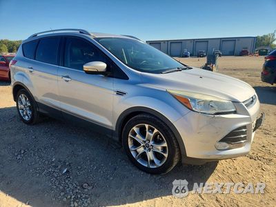Czwarte zdjęcie samochodu z boku: 2014 FORD ESCAPE TITANIUM VIN:1FMCU0J98EUB08022 - miniatura