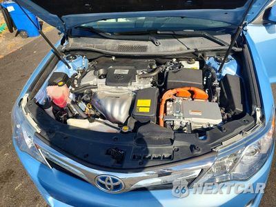 Zdjęcie 11 z 12 samochodu: 2012 TOYOTA CAMRY HYBRID XLE VIN:4T1BD1FK4CU050808 - miniatura
