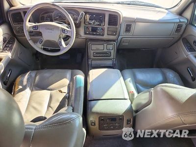 Zdjęcie 8 z 13 samochodu: 2004 GMC YUKON DENALI VIN:1GKEK63U04J296062 - miniatura