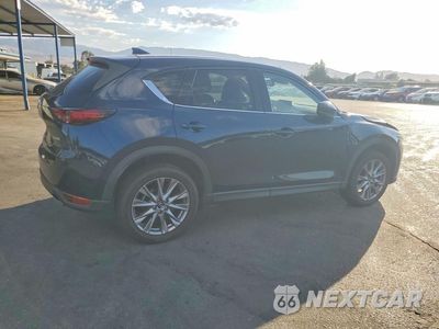 Trzecie zdjęcie samochodu z tyłu: 2021 MAZDA CX-5 GRAND TOURING VIN:JM3KFBDM7M1494347 - miniatura