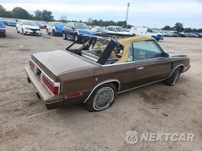 Trzecie zdjęcie samochodu z tyłu: 1984 DODGE 600 VIN:1B3BV55G2EG116667 - miniatura