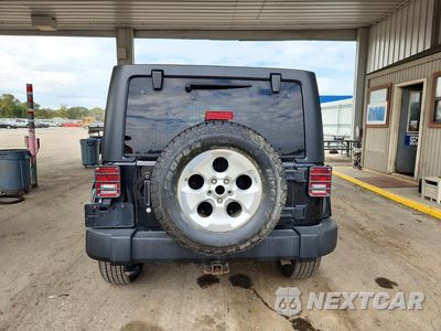 Zdjęcie 6 z 12 samochodu: 2015 JEEP WRANGLER UNLIMITED SAHARA VIN:1C4BJWEG4FL630318 - miniatura