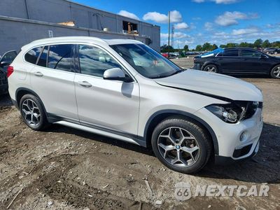 Czwarte zdjęcie samochodu z boku: 2018 BMW X1 XDRIVE28I VIN:WBXHT3C32J3H33481 - miniatura