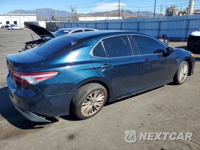 Trzecie zdjęcie samochodu z tyłu: 2018 TOYOTA CAMRY HYBRID XLE VIN:4T1B21HK5JU506749 - miniatura
