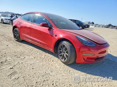 Czwarte zdjęcie samochodu z boku: 2023 TESLA MODEL 3 VIN:5YJ3E1EA5PF552501 - miniatura