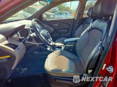 Zdjęcie 7 z 13 samochodu: 2012 HYUNDAI TUCSON GLS VIN:KM8JUCAC0CU374054 - miniatura