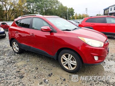 Czwarte zdjęcie samochodu z boku: 2013 HYUNDAI TUCSON GLS VIN:KM8JUCAC7DU729237 - miniatura